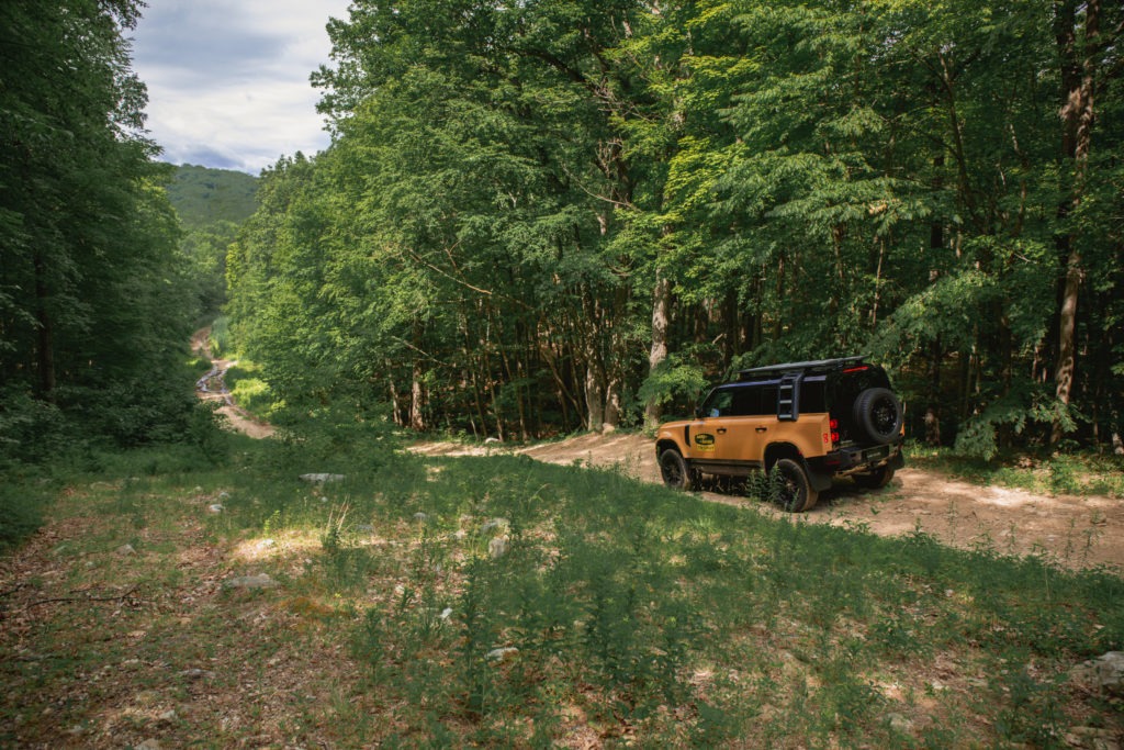 Land Rover descending a hill.