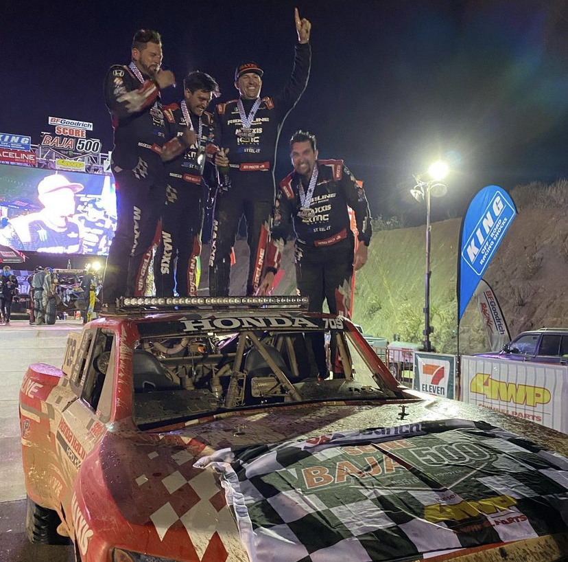 Honda Off-Road Racing Team taking winner's photo at finish line of Baja 500.