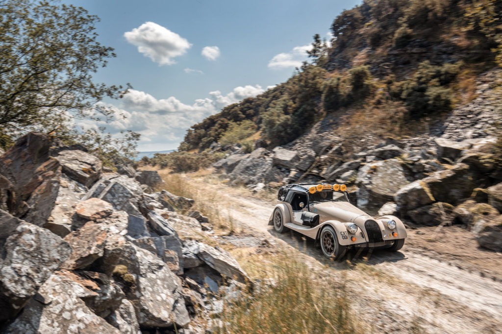 Morgan C-XT races down a desert two track.