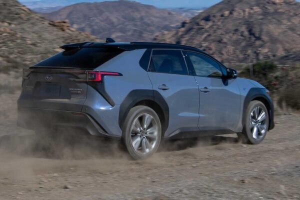 2023 Subaru Solterra driving through the desert