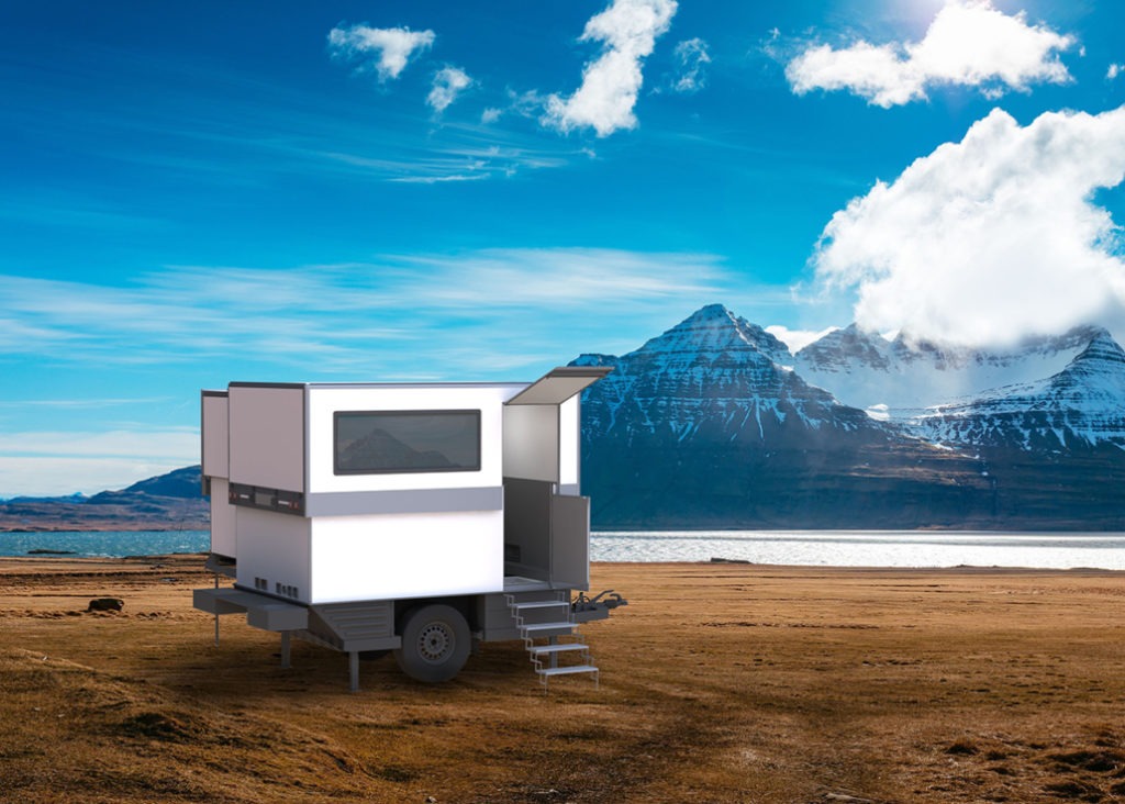 Rendering of the ICC Offroad FlexCamp Trailer in the wilderness near a mountain and lake.