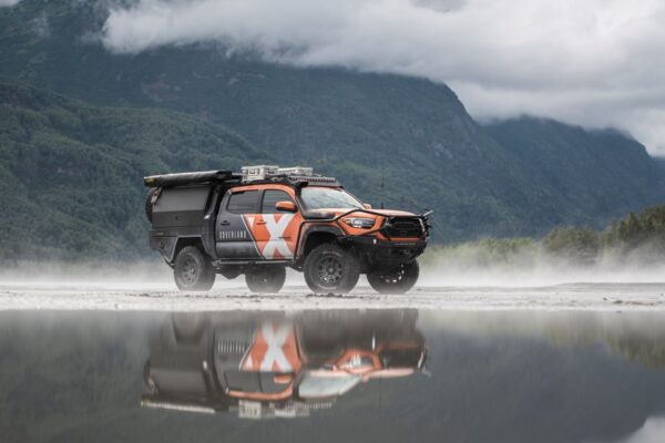 PCOR equipped Toyota Tacoma near a water source.
