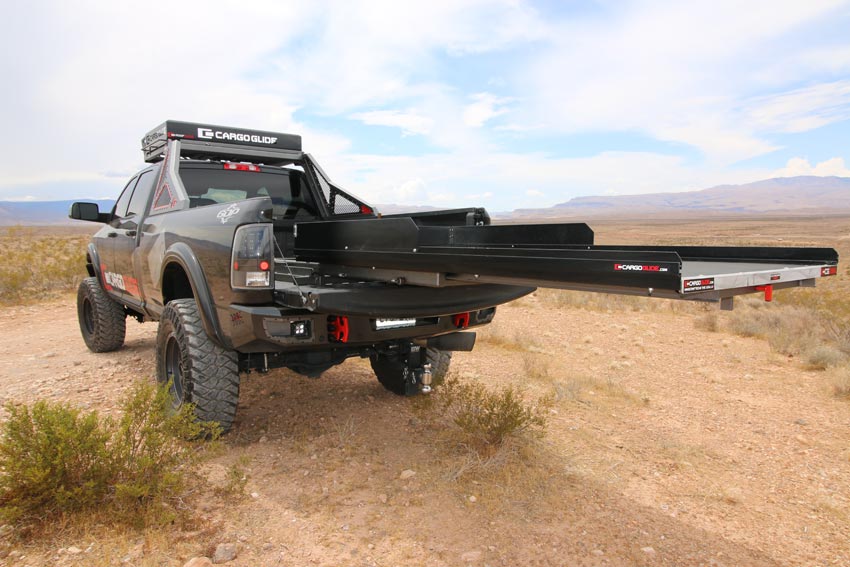 CargoGlide truck bed slide platform in use in the desert.