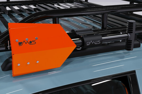 DMOS Compact Delta Shovel Mounted to a vehicle roof rack.