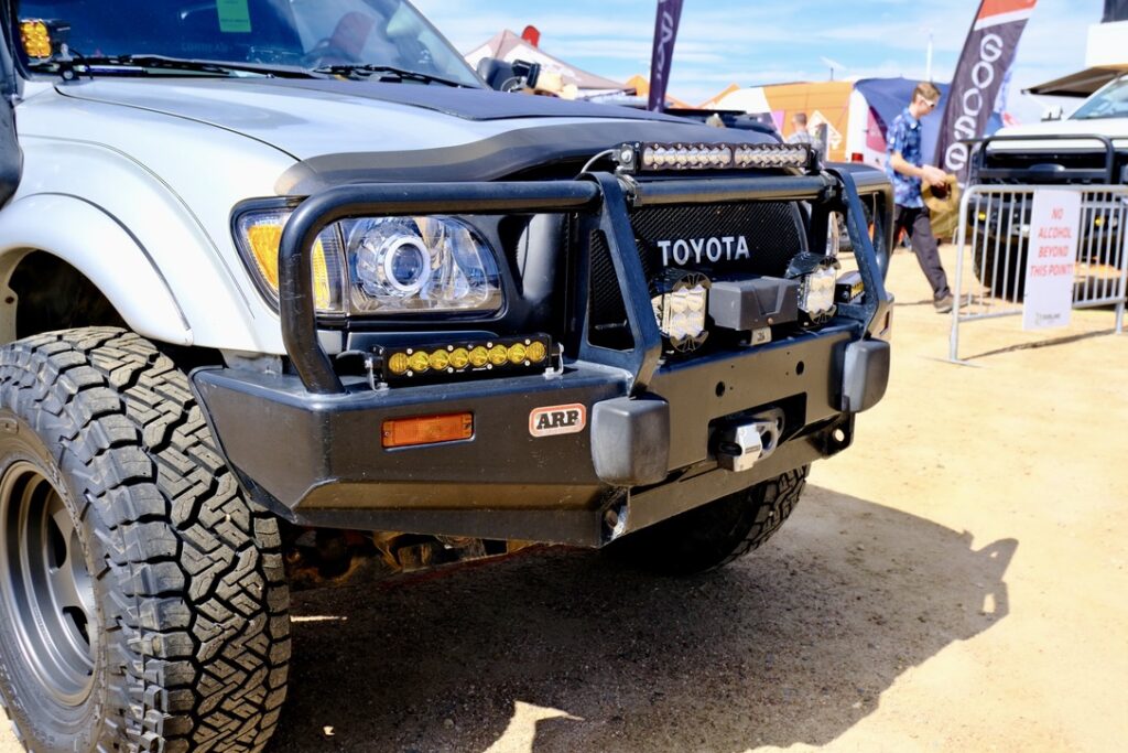 A first generation Tacoma at Overland Expo Mountain West 2024.
